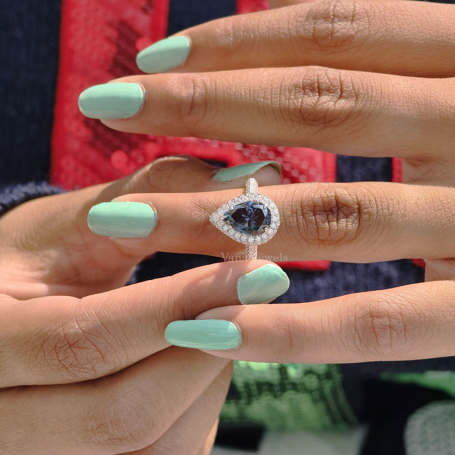 Royal blue pear moissanite three side pave ring