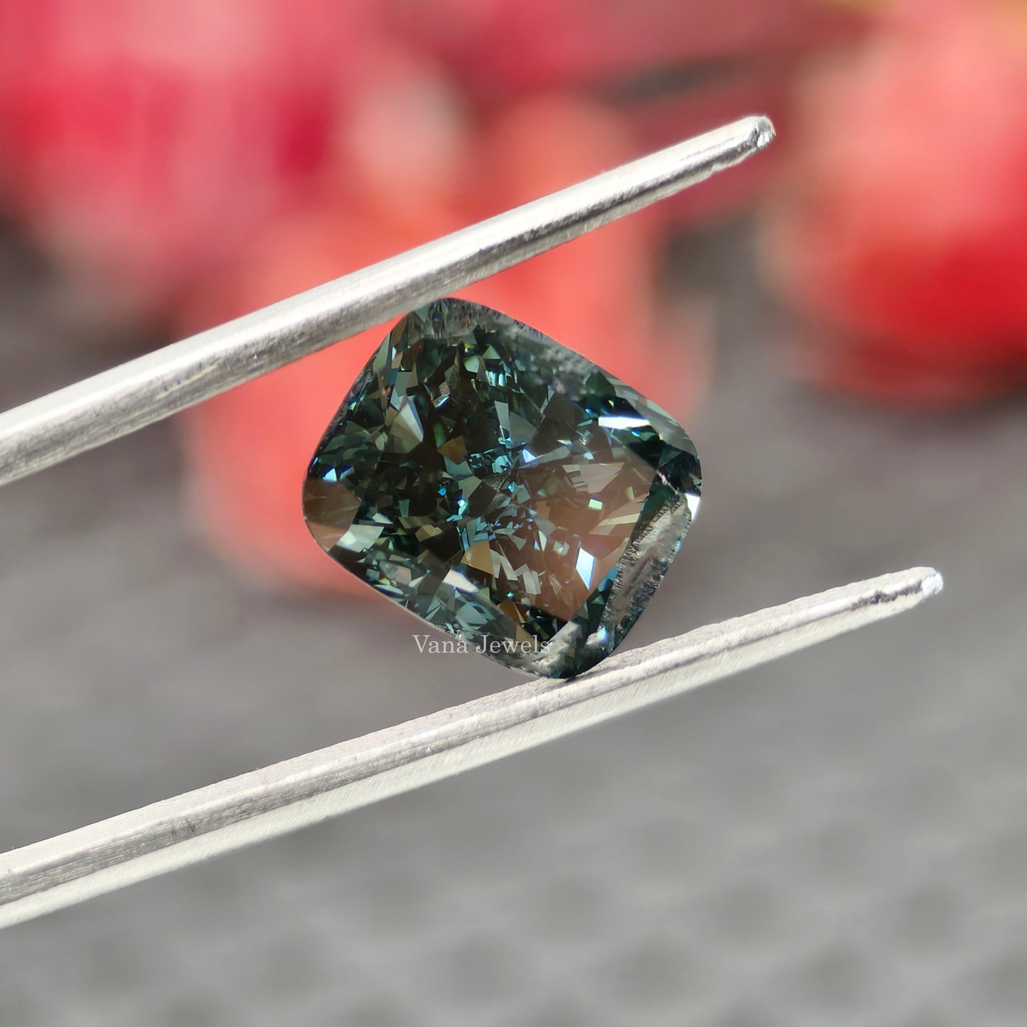 Brilliant greenish blue lab diamond with elongated cushion cut