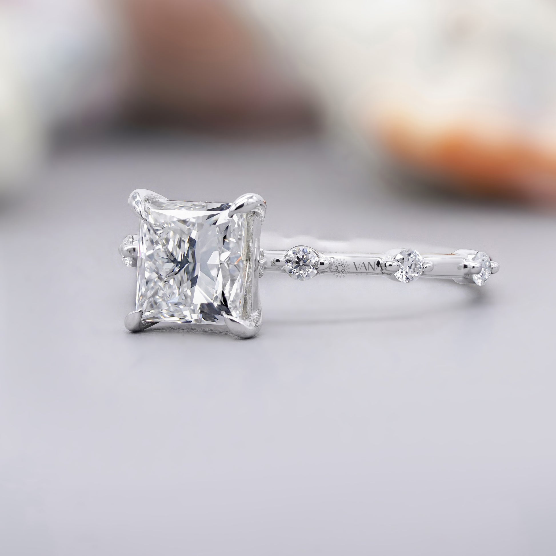 White gold princess cut moissanite ring