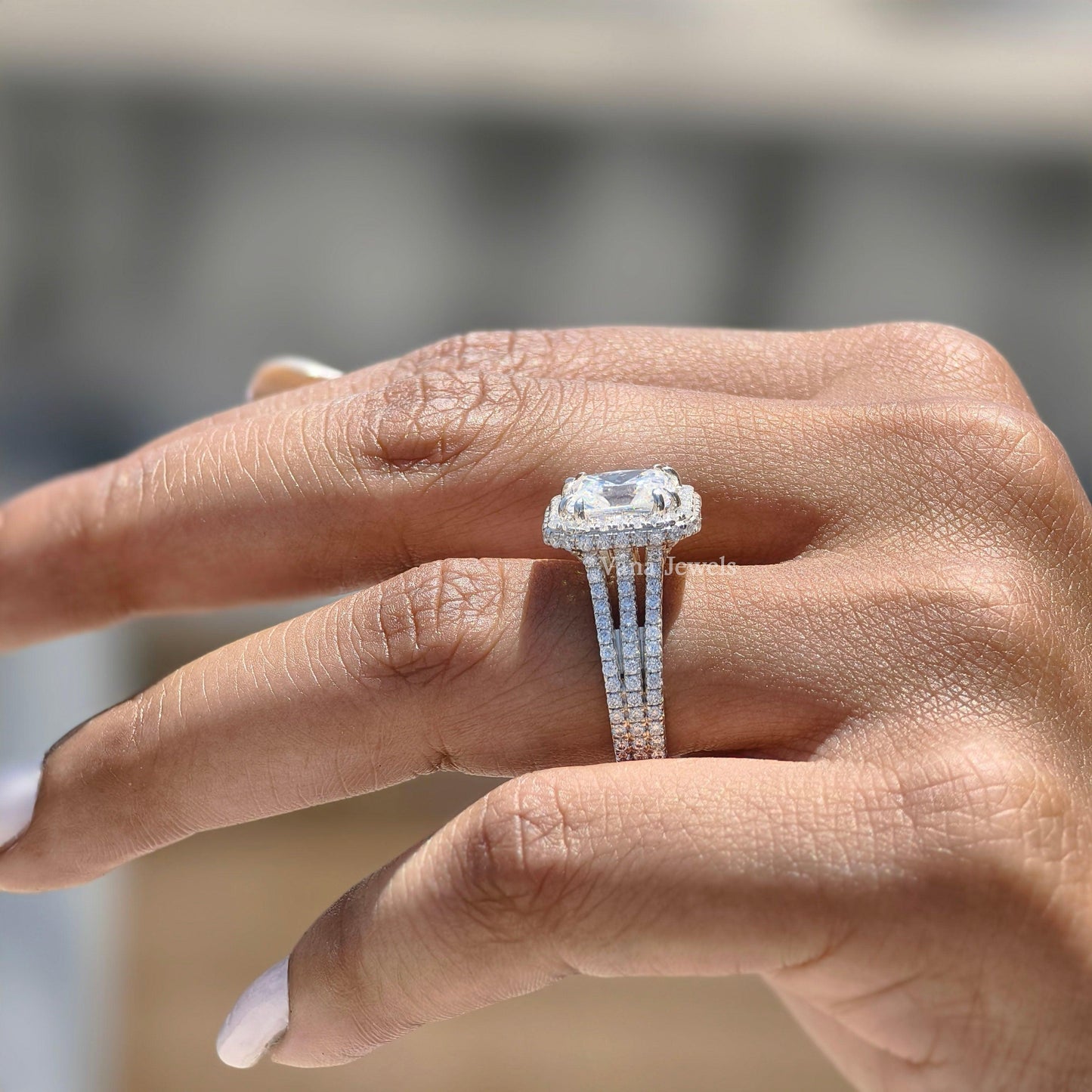 Stunning radiant engagement ring with hidden halo and triple pave shank