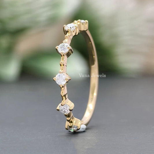 Minimalist moissanite wedding band