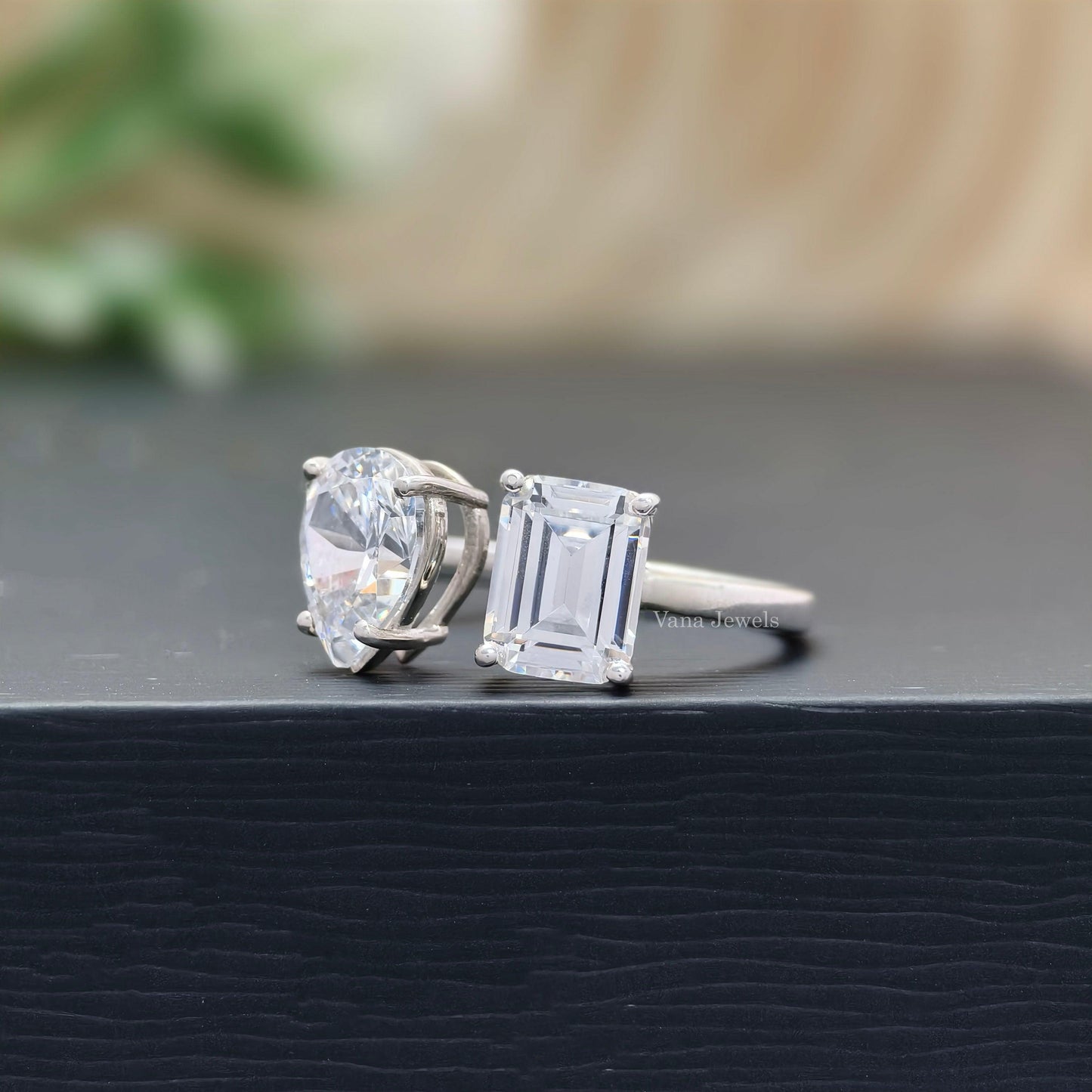 Emerald and pear moissanite bridal ring