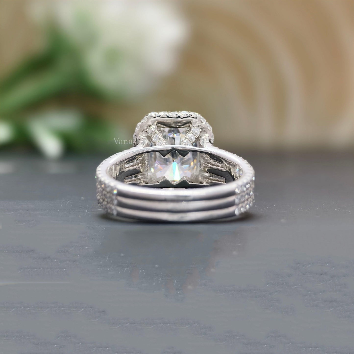 Three-row pave band moissanite ring with radiant cut center stone