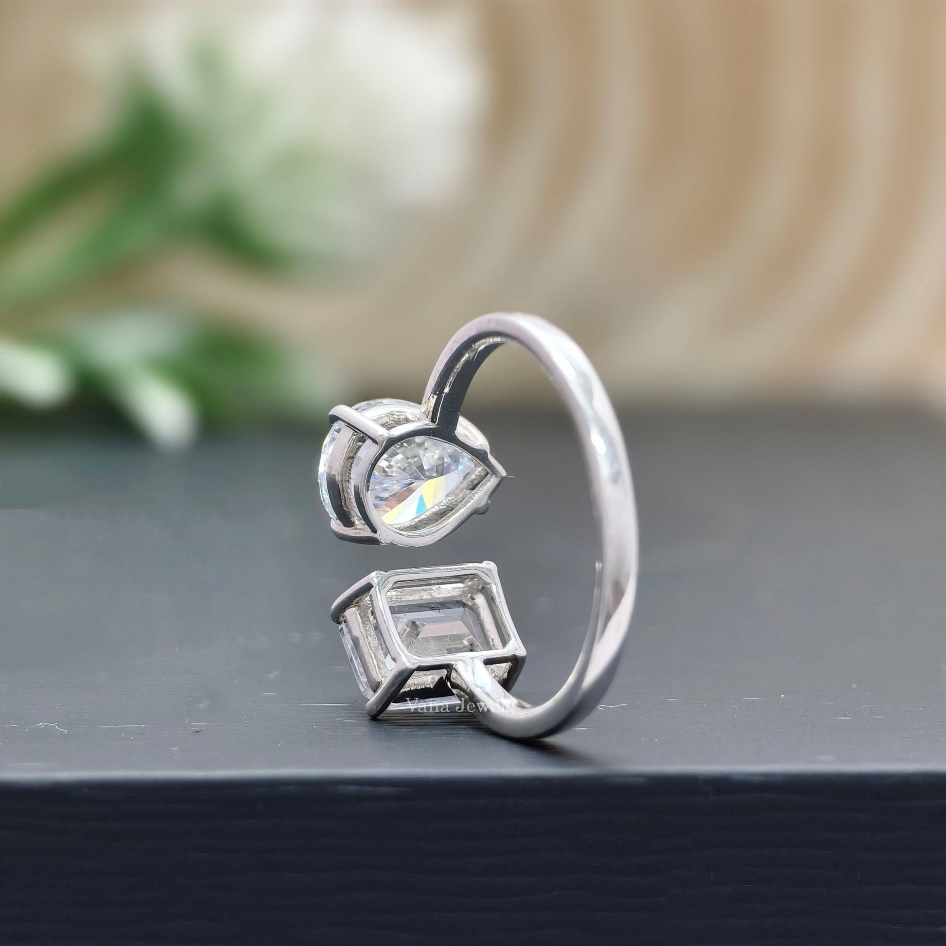 Pear & emerald cut moissanite two stone engagement ring