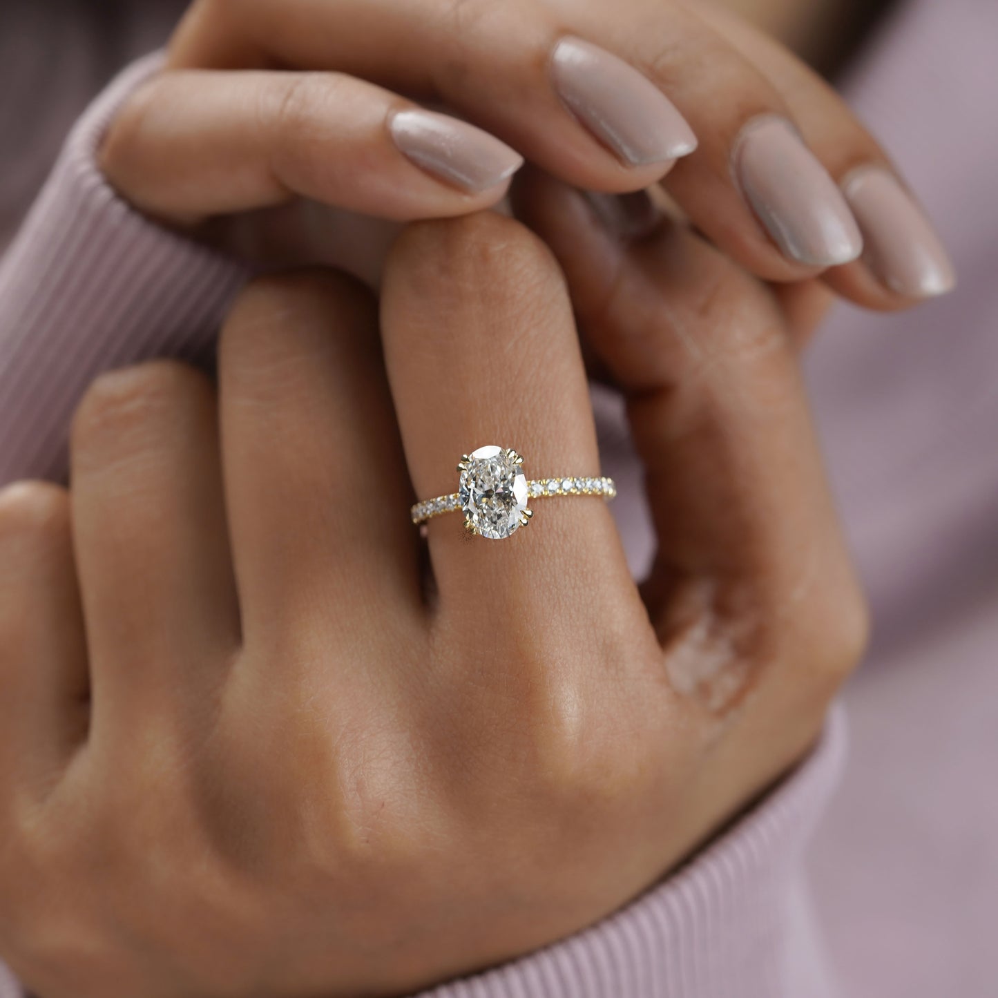 Pave set band with oval cut lab diamond hidden halo ring
