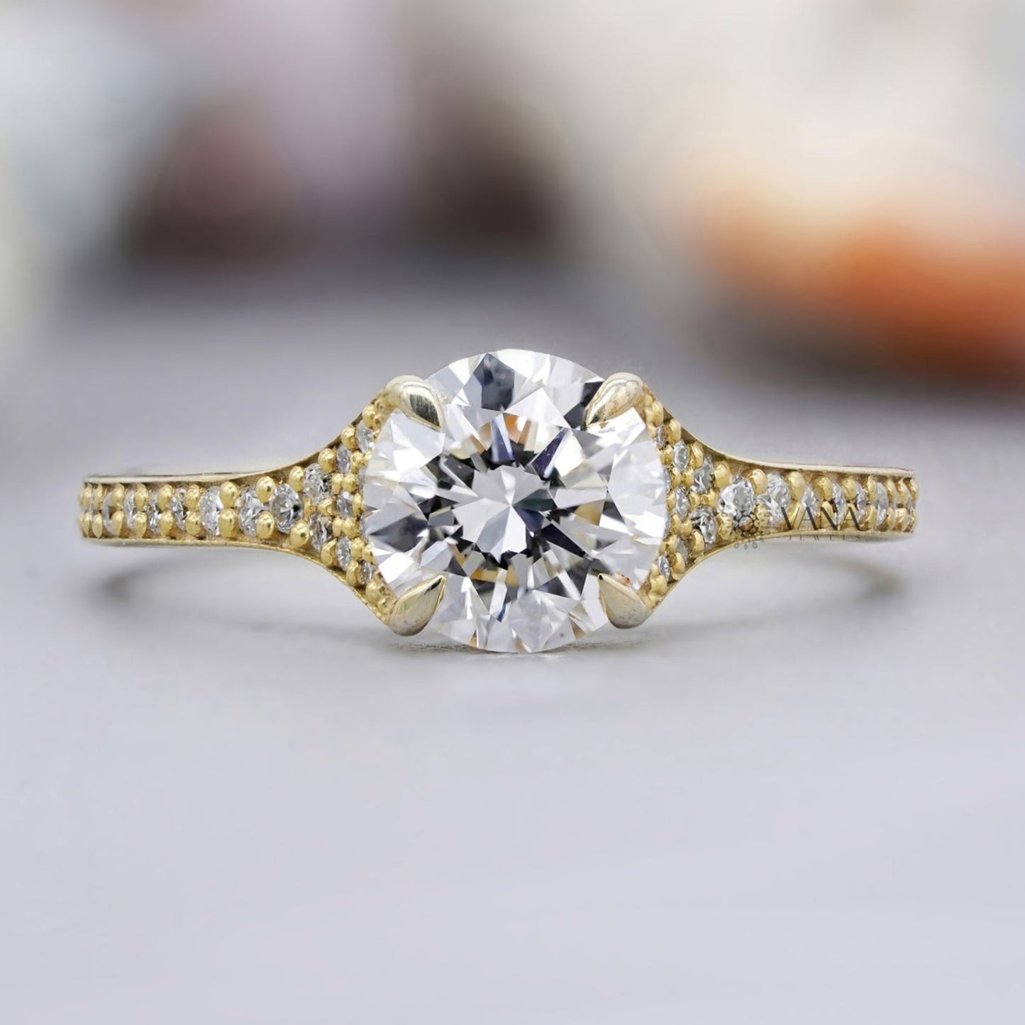 Round cut moissanite engagement ring