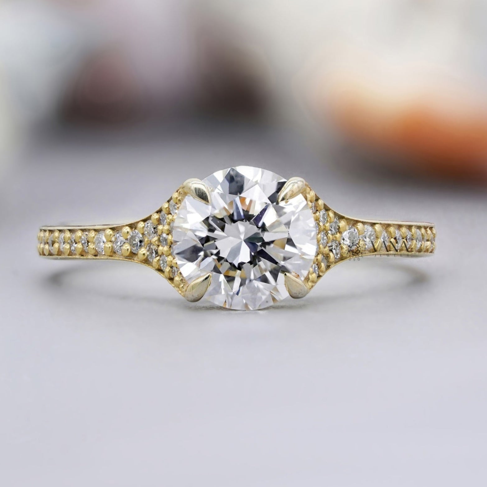 Round cut moissanite engagement ring