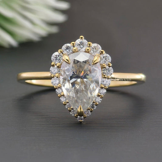 Pear cut moissanite halo ring
