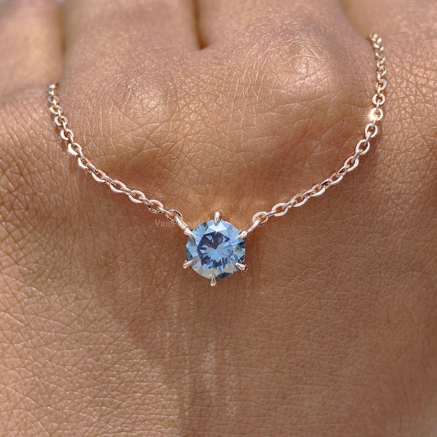 Round cut royal blue moissanite solitaire pendant in gold