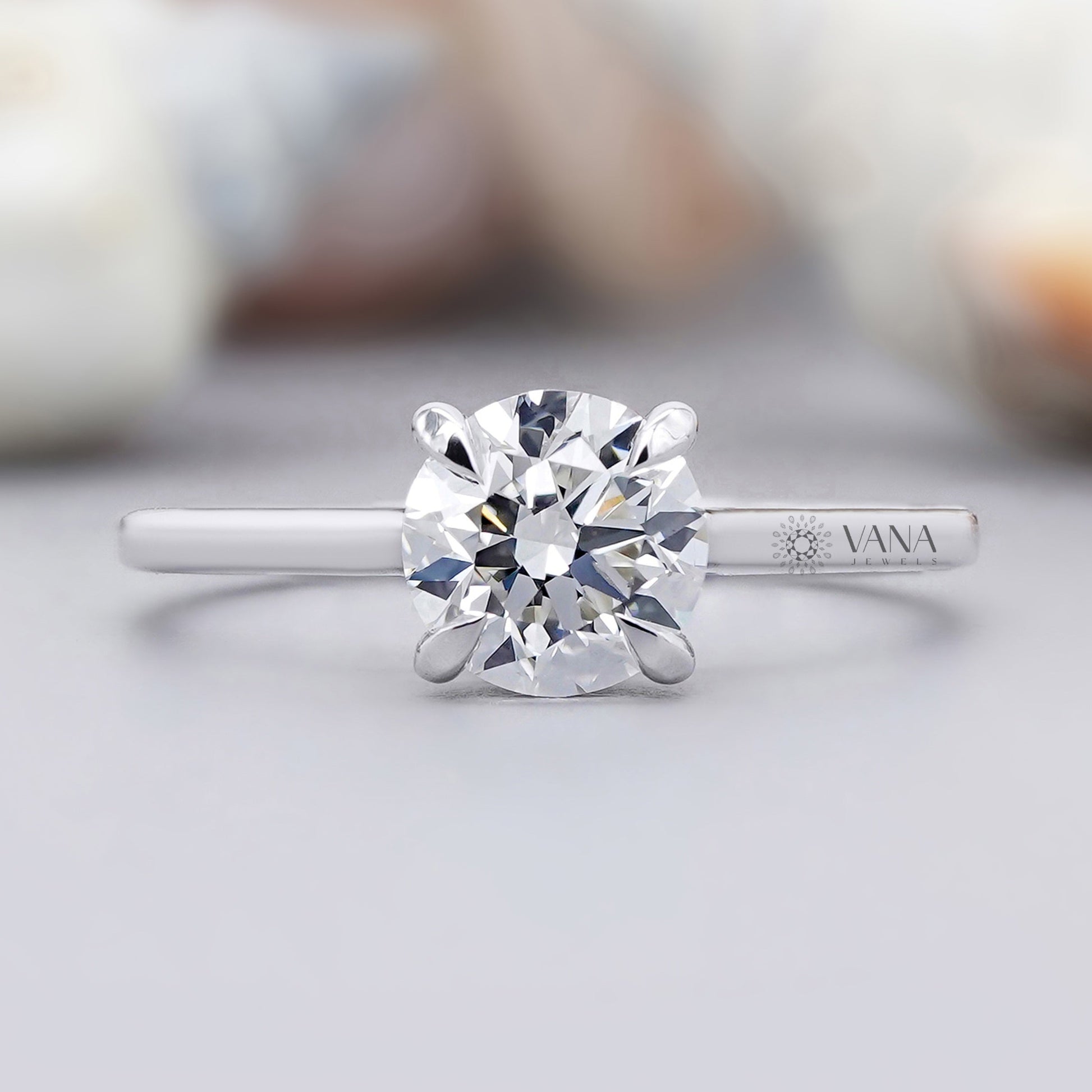 Round moissanite solitaire ring