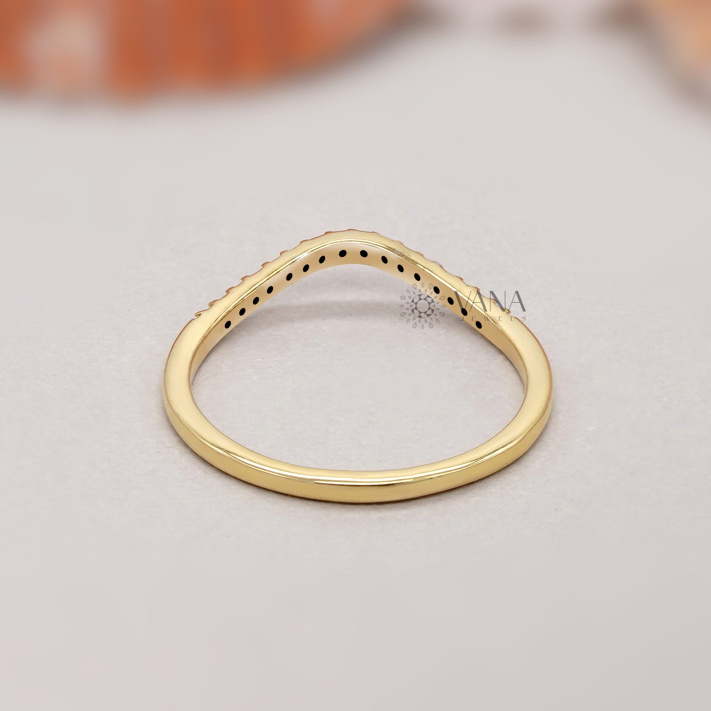 Thin gold wedding band with pave diamonds