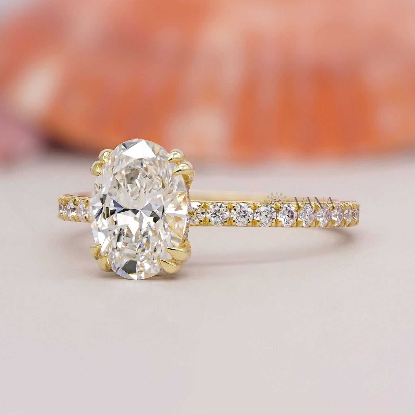 Double claw prong oval lab diamond ring in hidden halo design