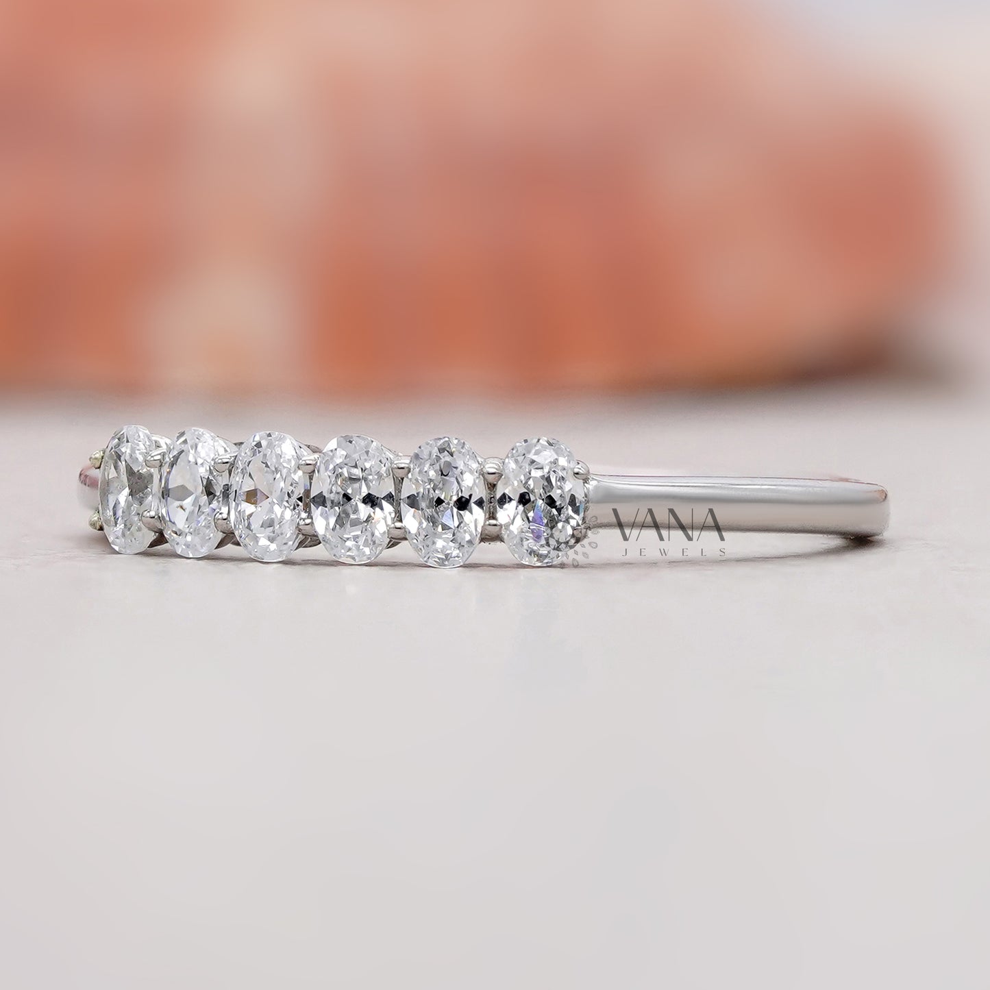 Lab created oval cut diamond ring