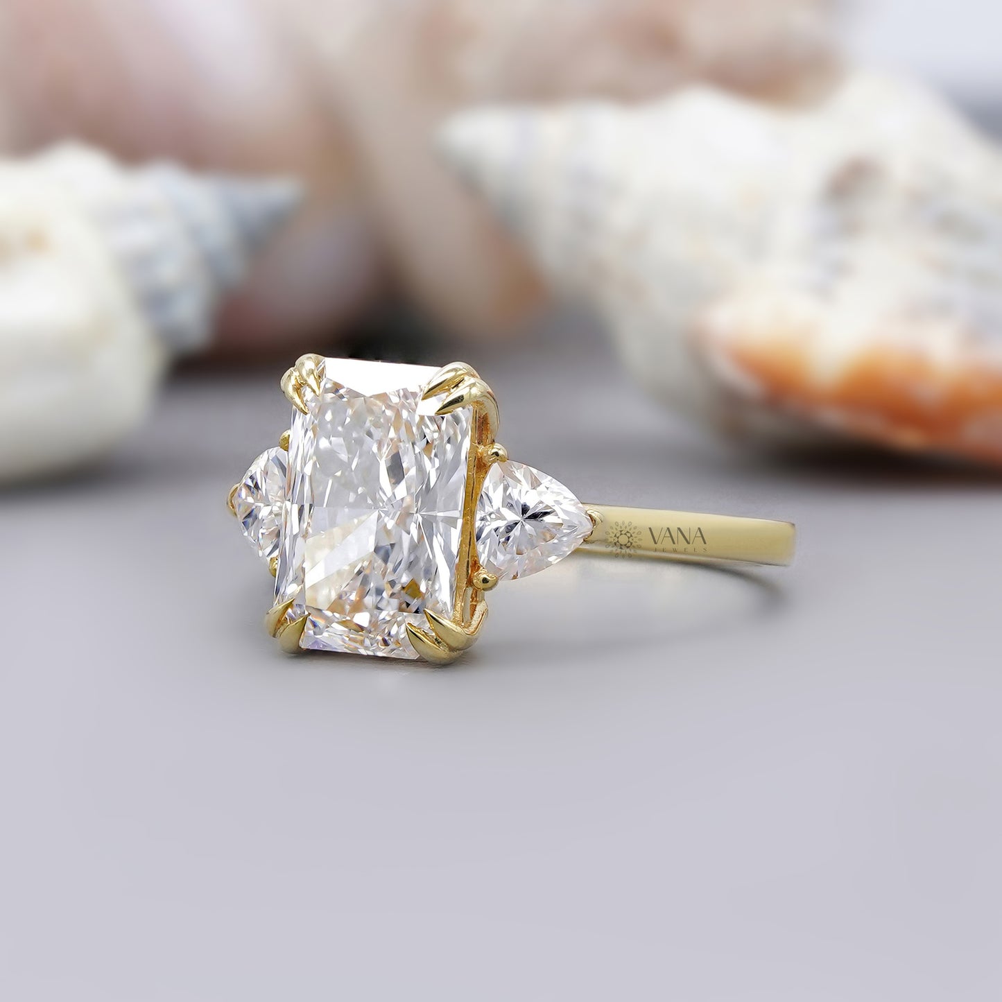 Moissanite engagement ring with side trillions