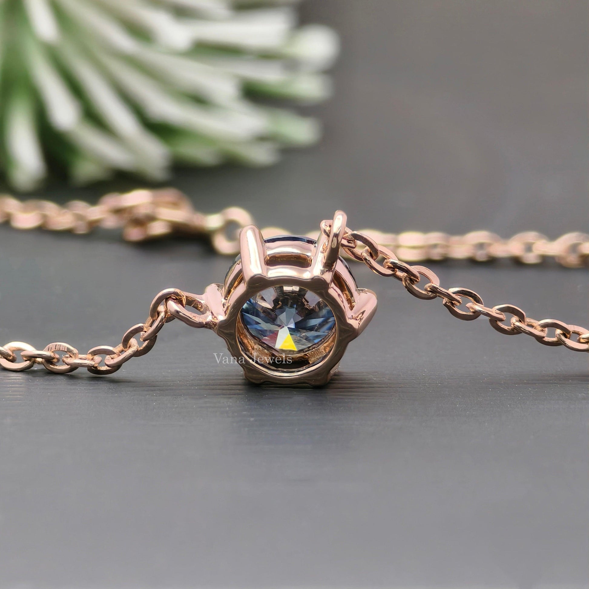 Solitaire style round moissanite pendant