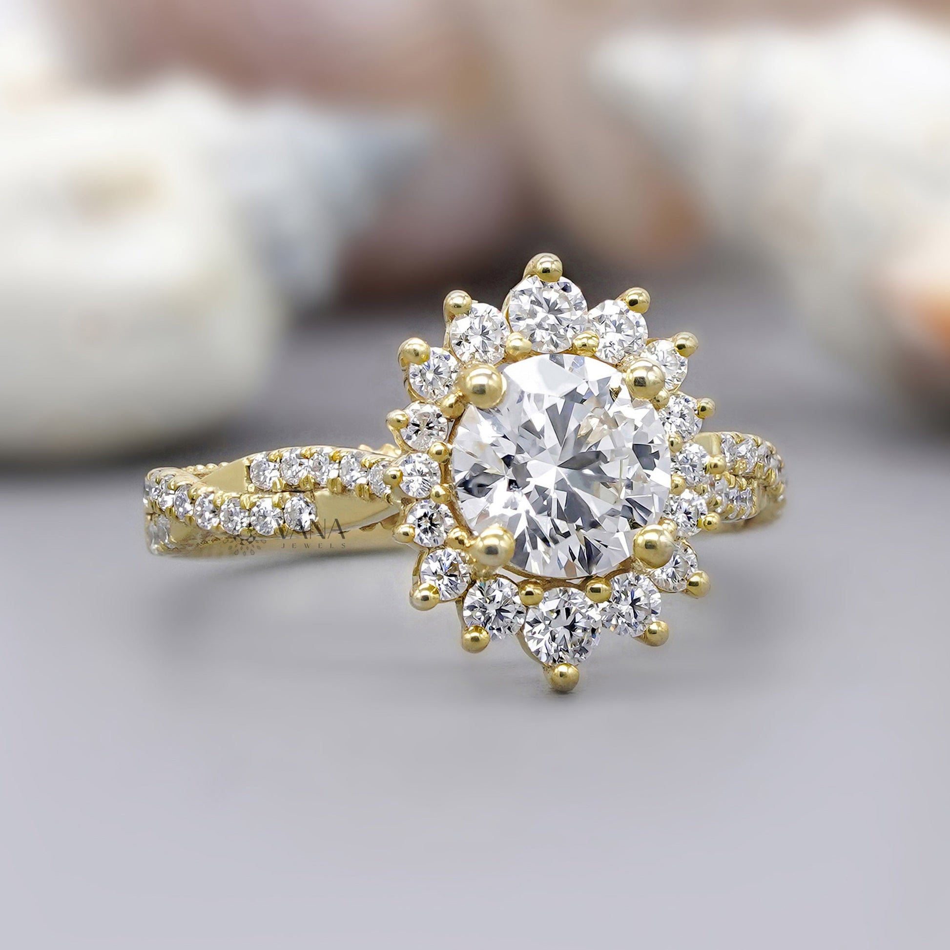 Yellow gold round cut moissanite ring featuring floral halo and sunburst style