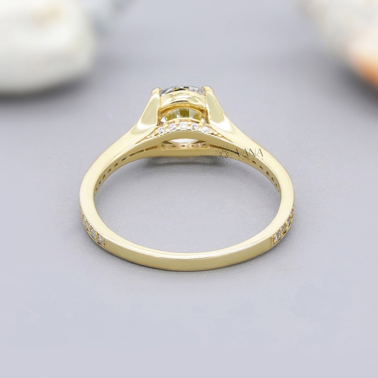 Yellow gold moissanite engagement ring