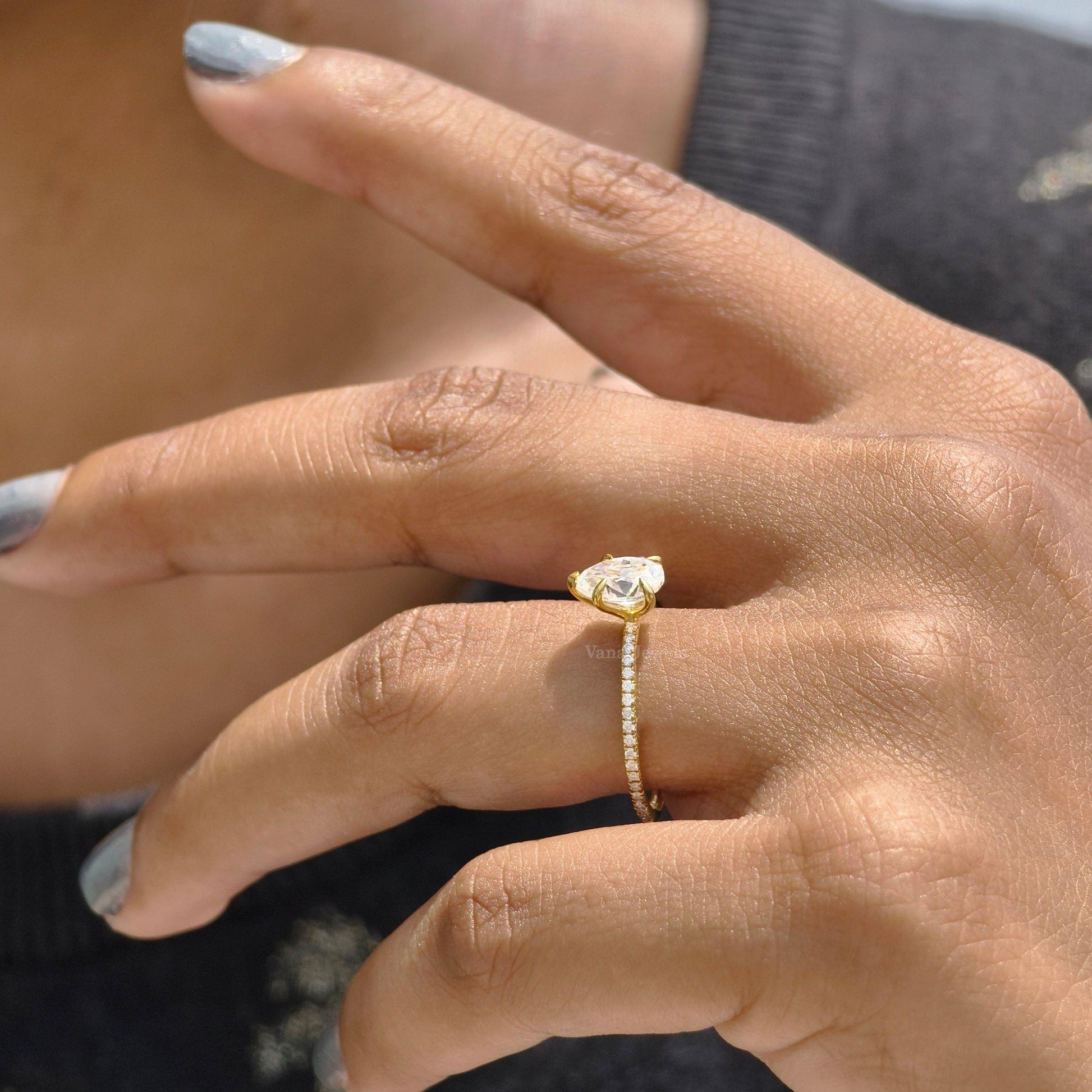 Pear cut moissanite wedding ring