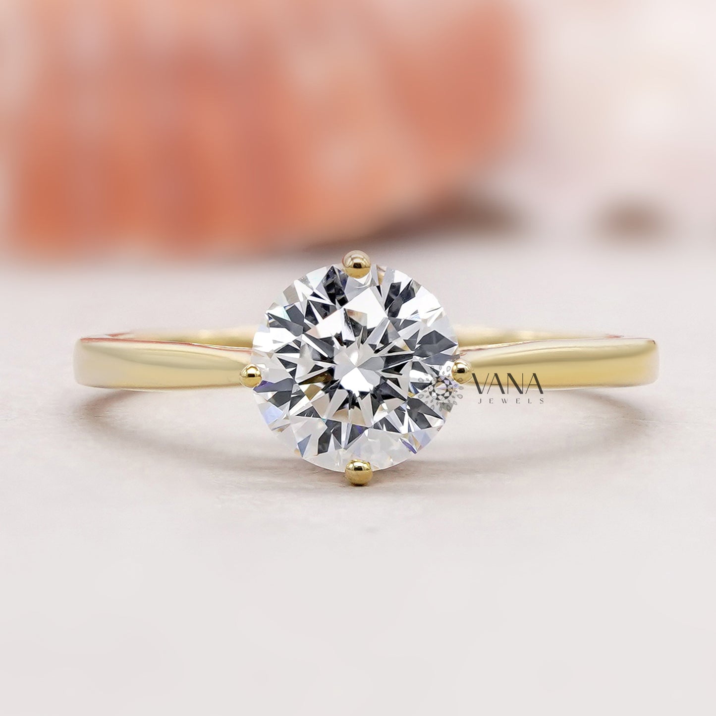Cathedral set solitaire engagement ring