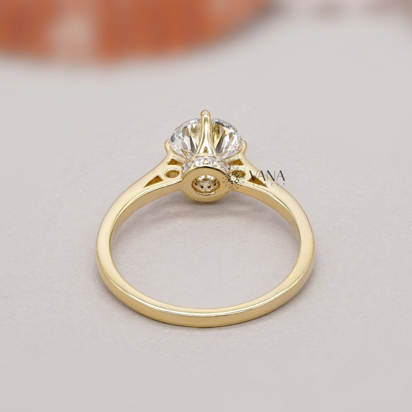Round cut lab grown diamond ring with hidden halo