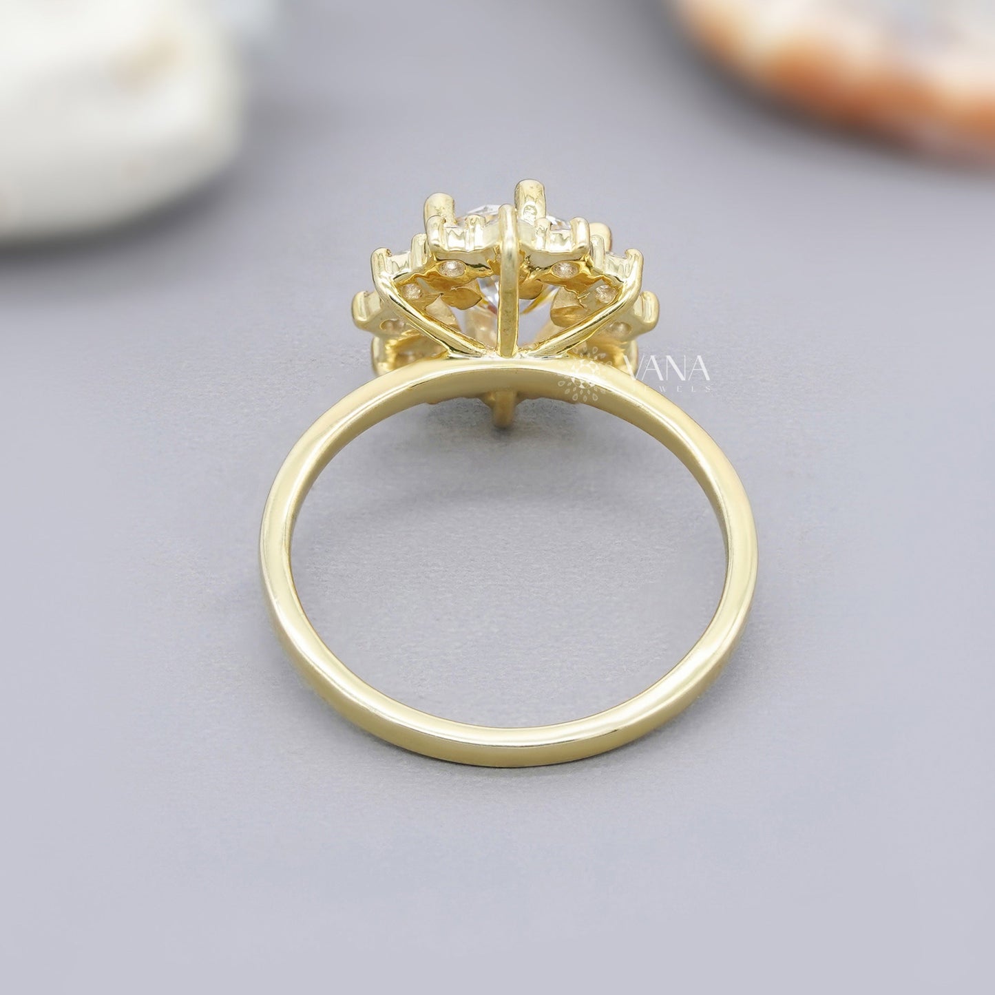 Handmade yellow gold engagement ring with flower-style