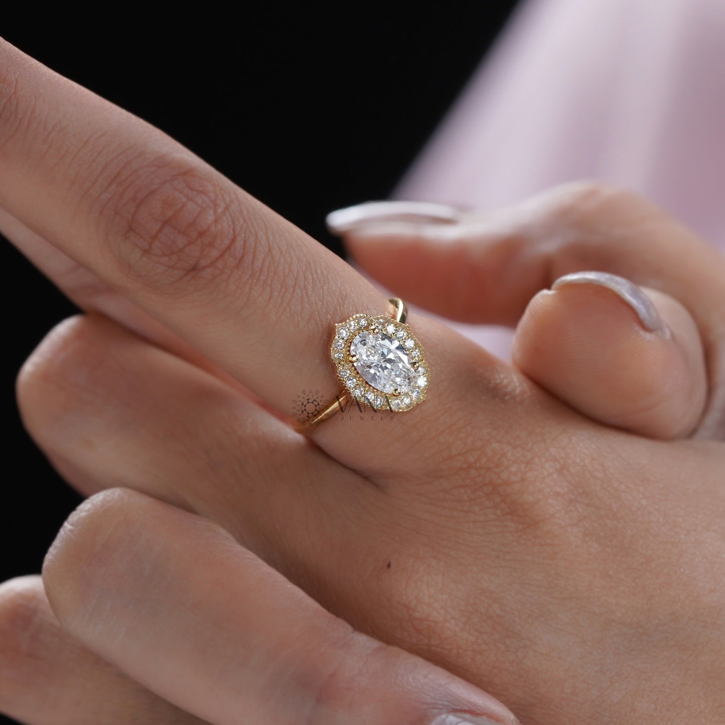 Lab grown oval diamond ring with floral halo setting