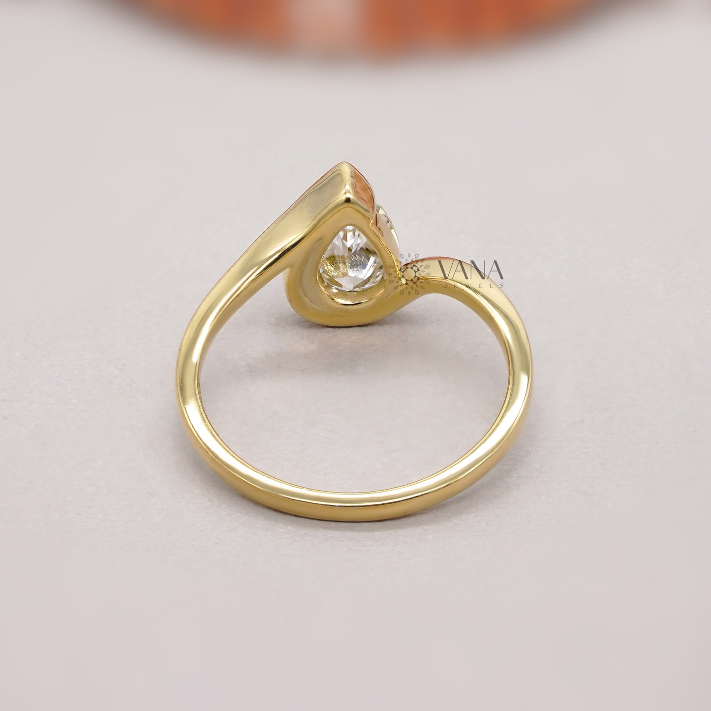 Teardrop Style Half Bezel Set Engagement Ring
