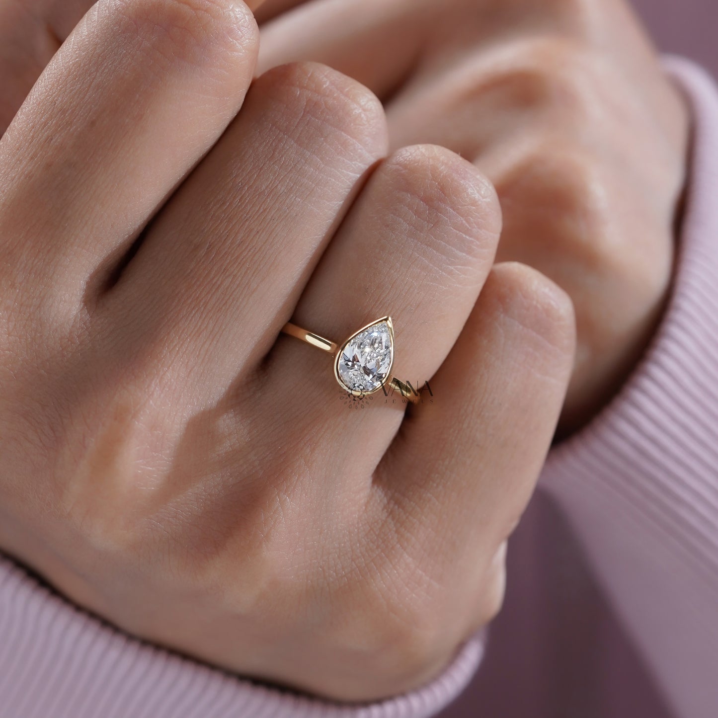 10K Yellow Gold Pear Diamond Bezel Ring