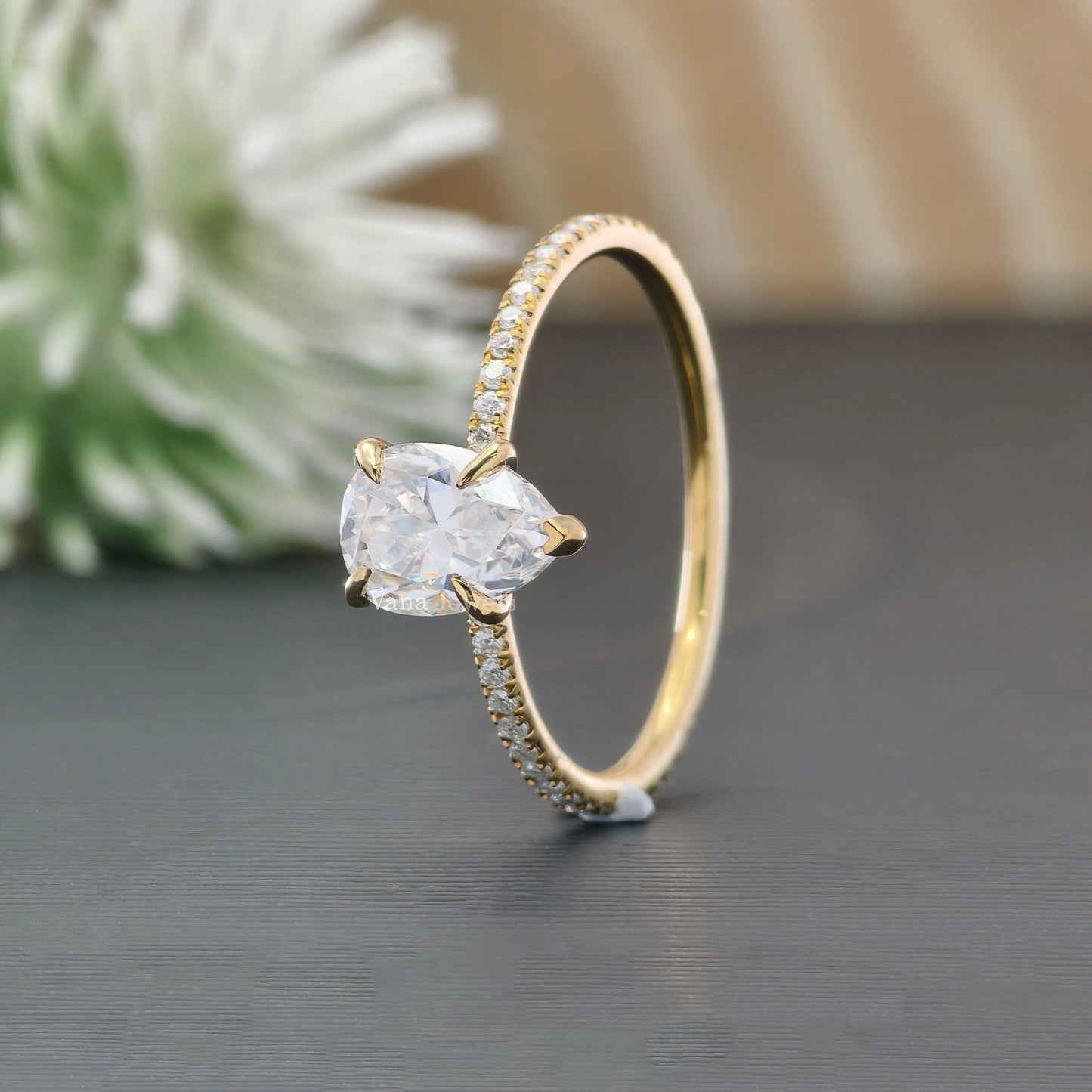 Gold pear cut bridal ring