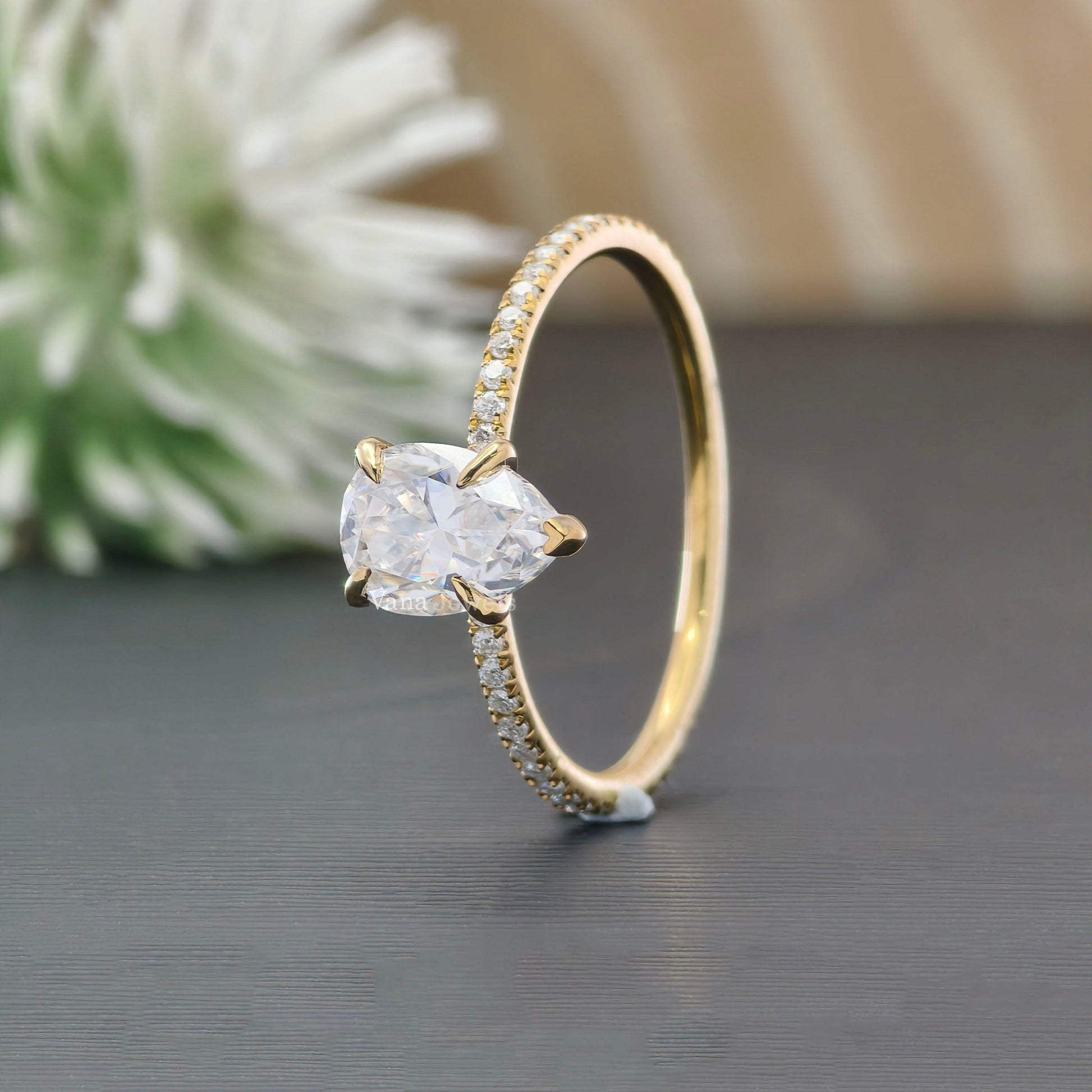 Gold pear cut bridal ring
