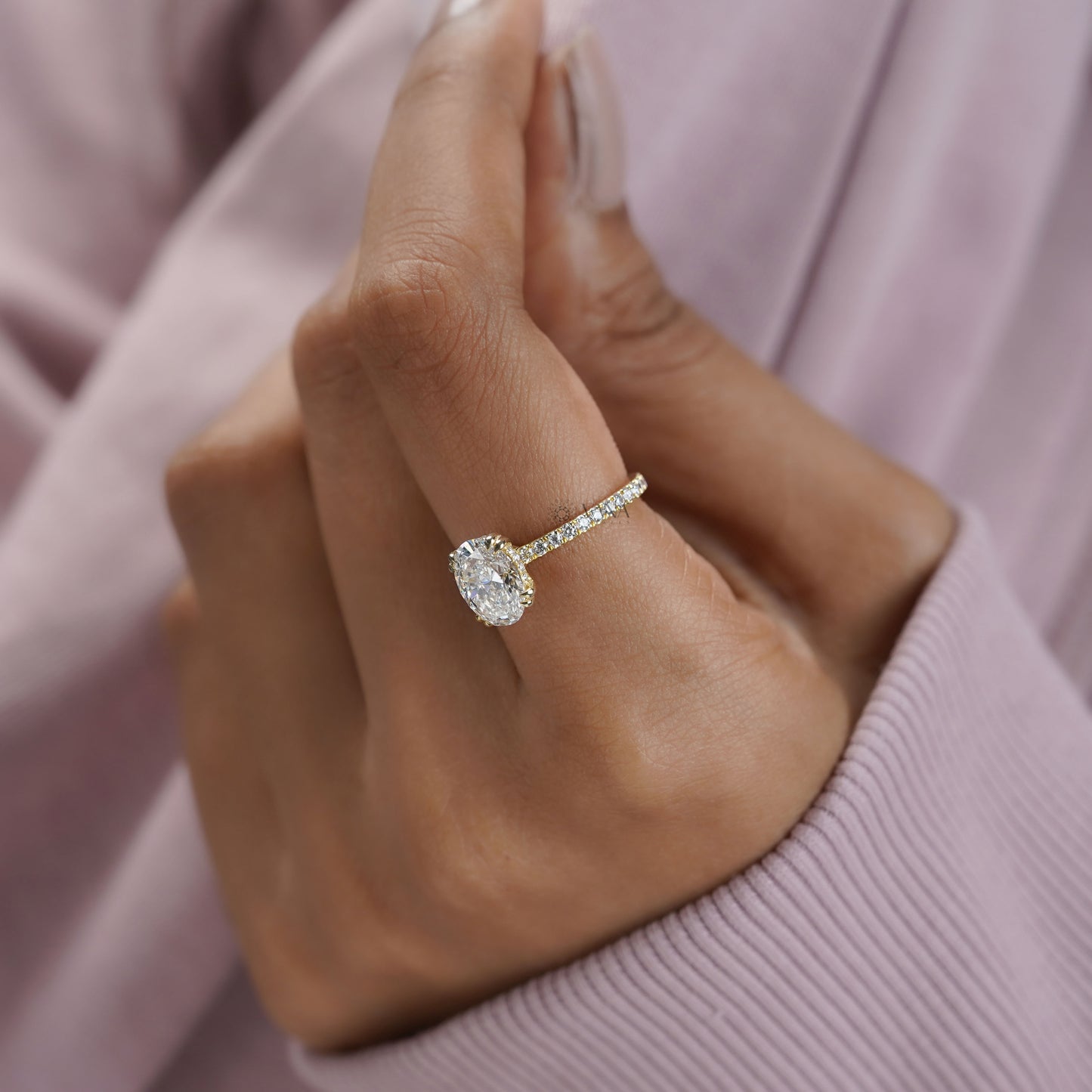 Oval hidden halo lab diamond ring handcrafted with double claw prongs