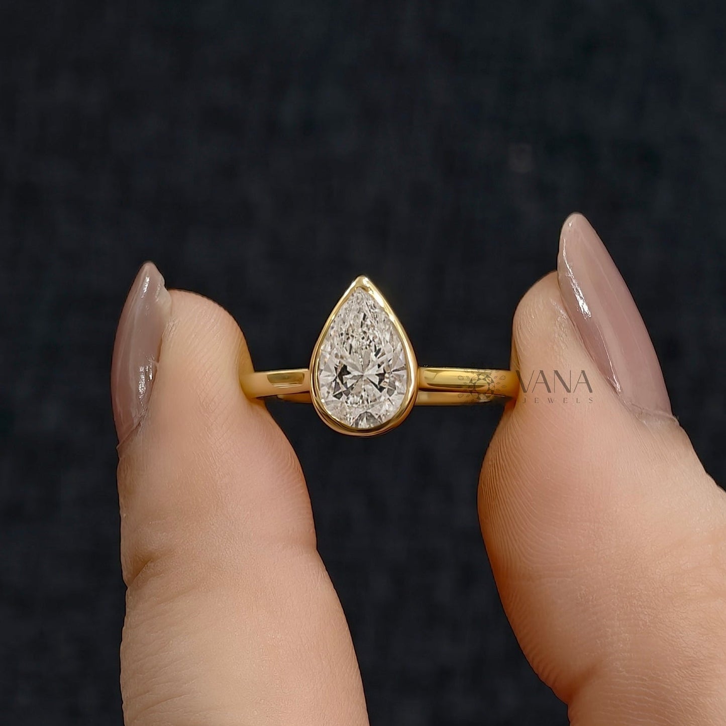 Bezel Set Pear Cut Moissanite Solitaire Engagement Ring with Cathedral Setting