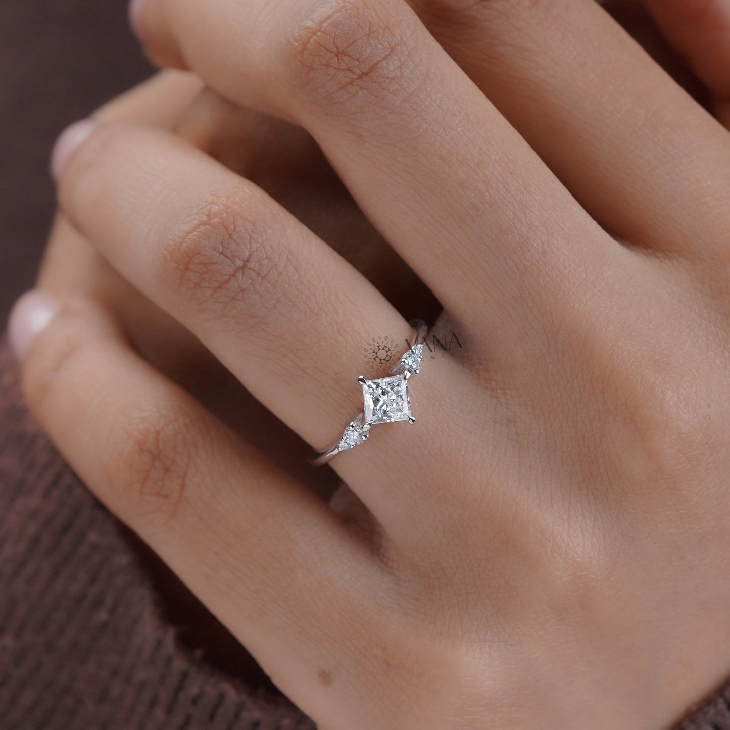 Square cut moissanite solitaire ring with accent side stones