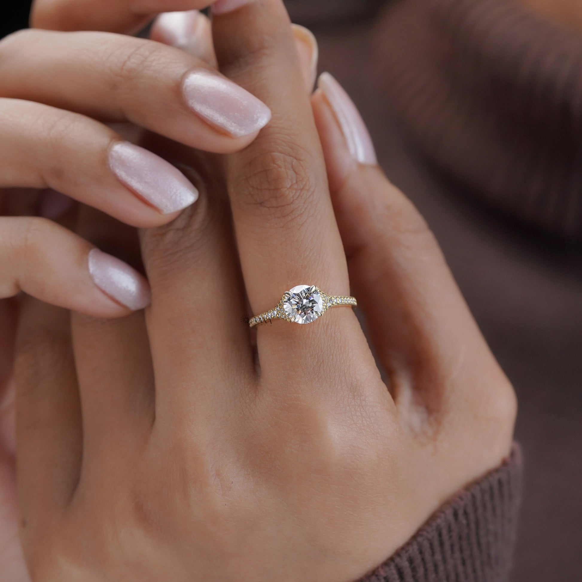 Pave moissanite engagement ring in gold