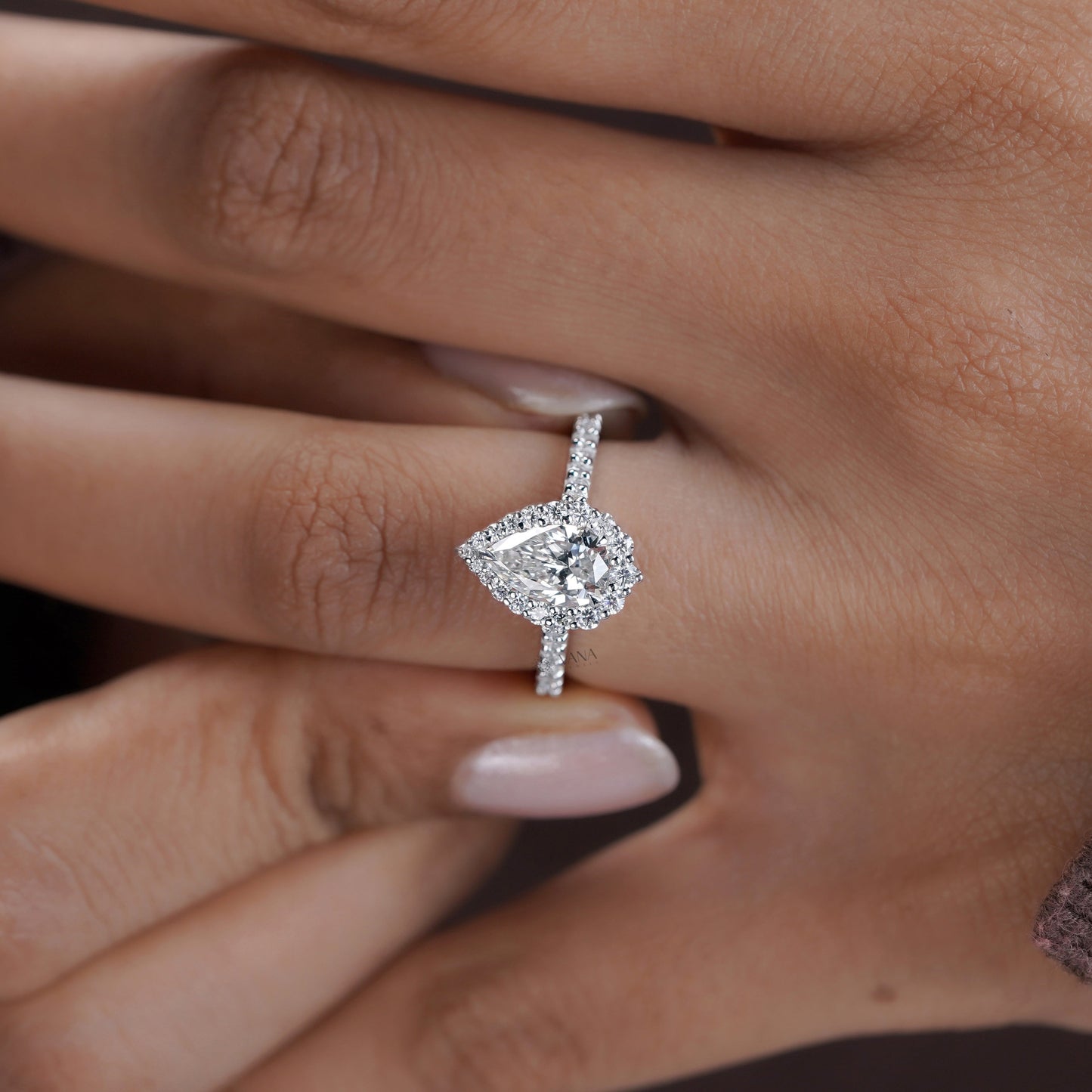 Pear cut moissanite halo anniversary ring for wife