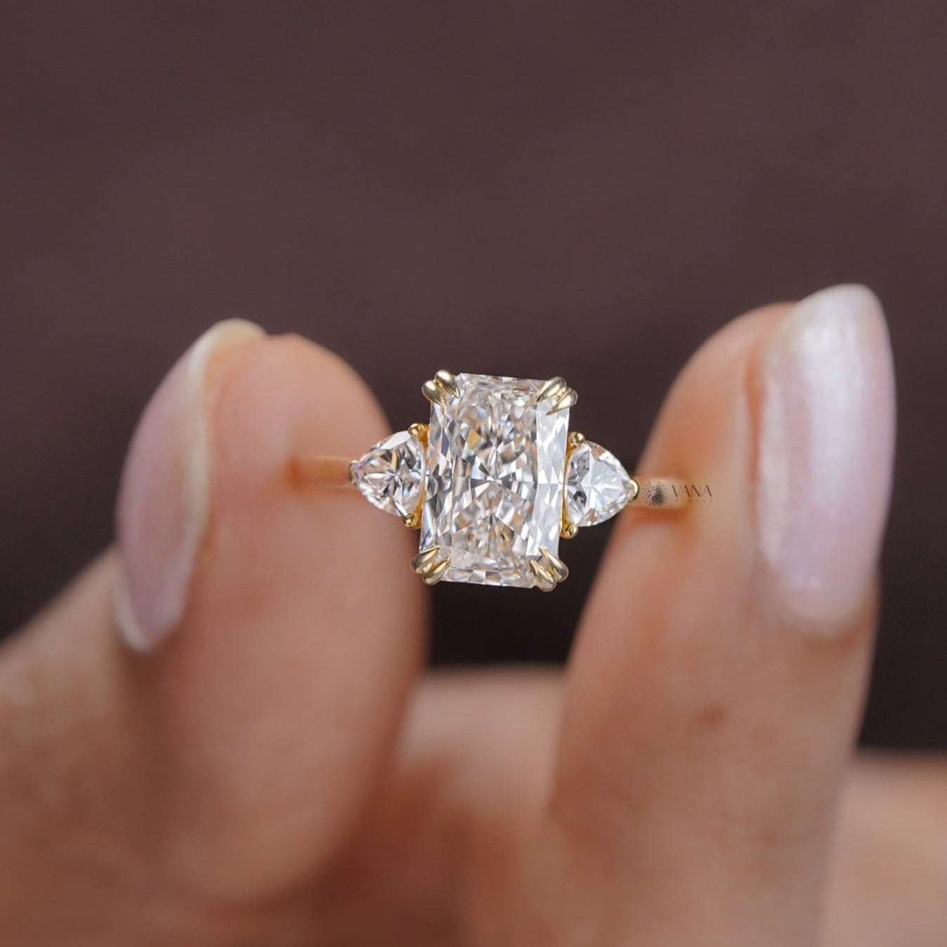 Trillion cut moissanite ring in 14K gold