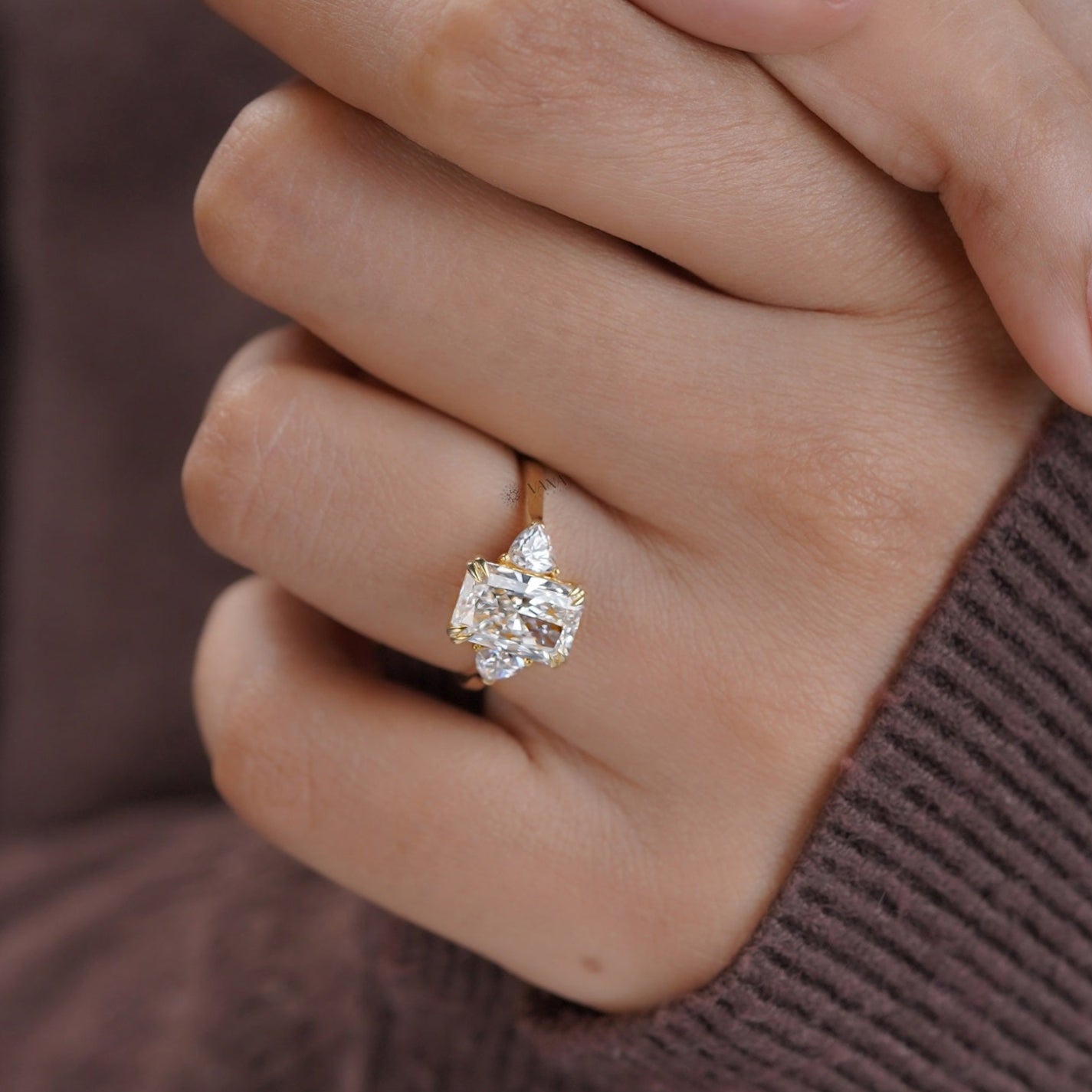 Yellow gold radiant cut ring