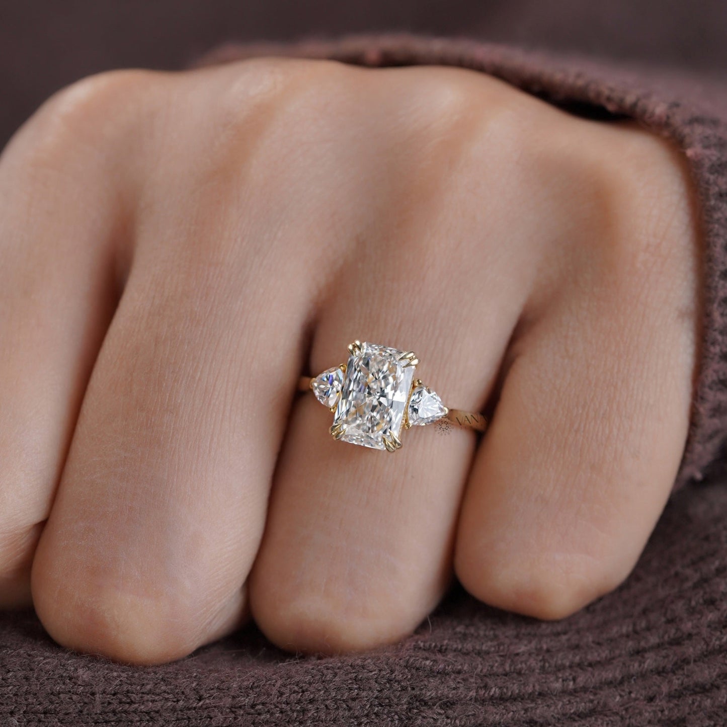 Radiant moissanite ring with double claw prongs