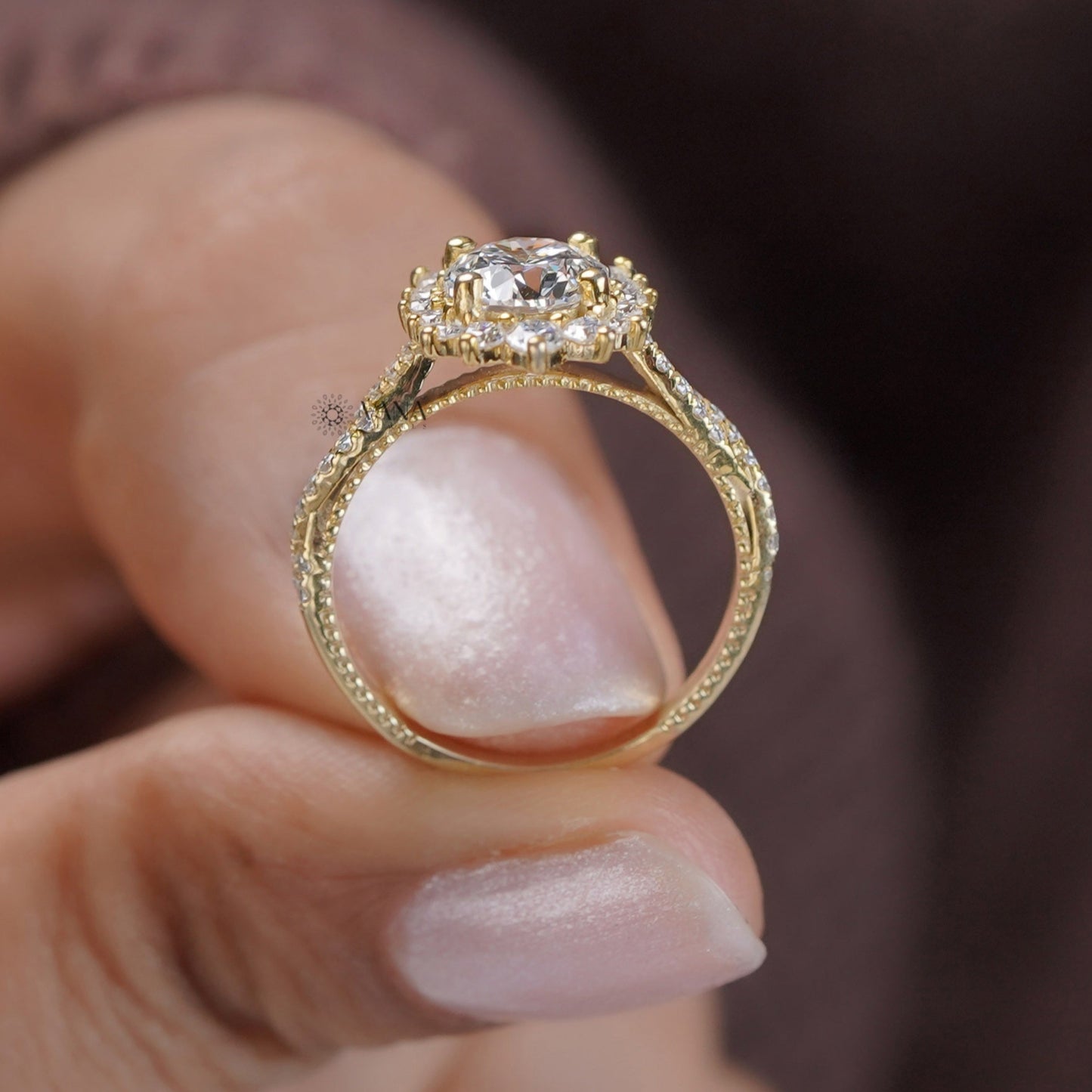 Vintage round cut moissanite halo and pave set ring