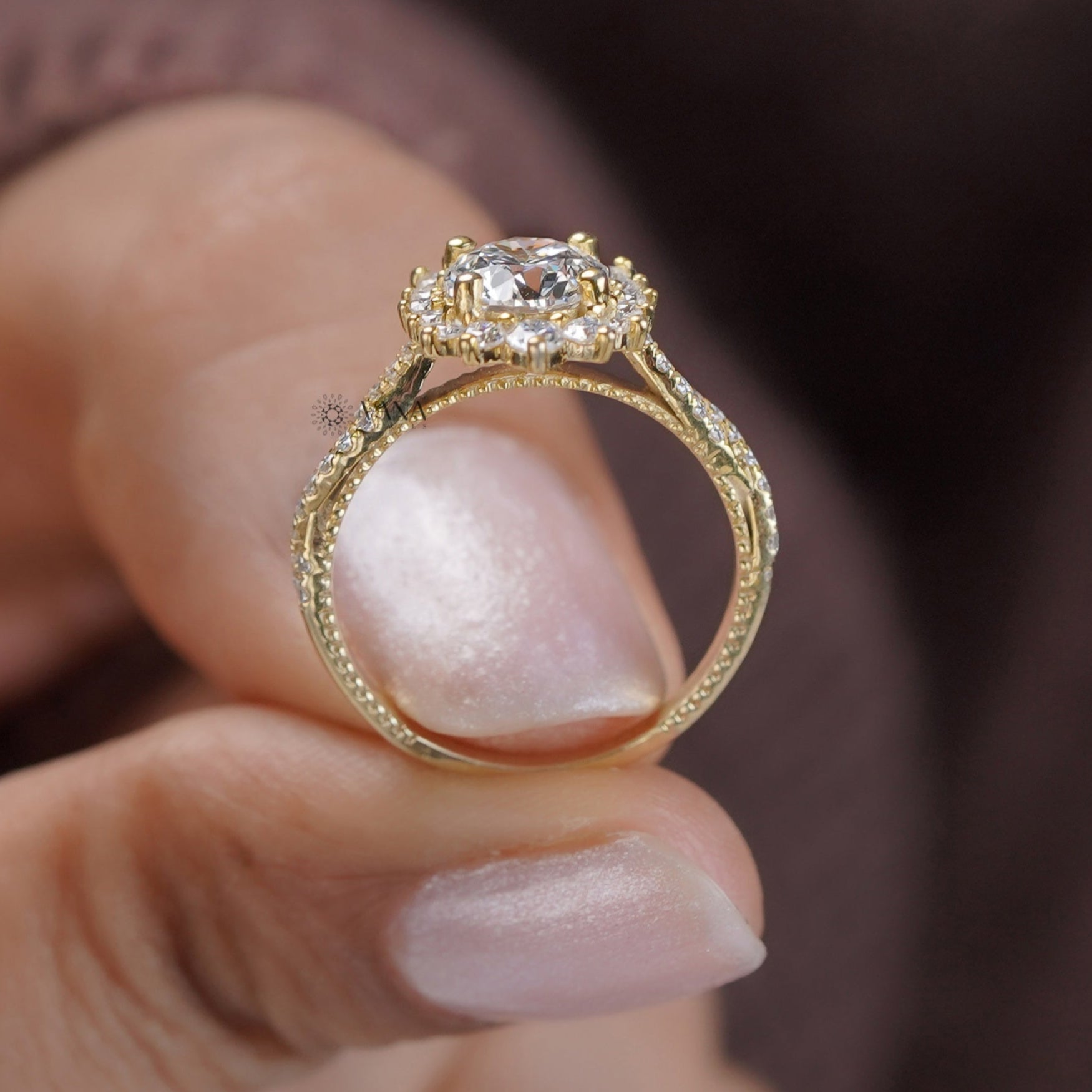 Vintage round cut moissanite halo and pave set ring
