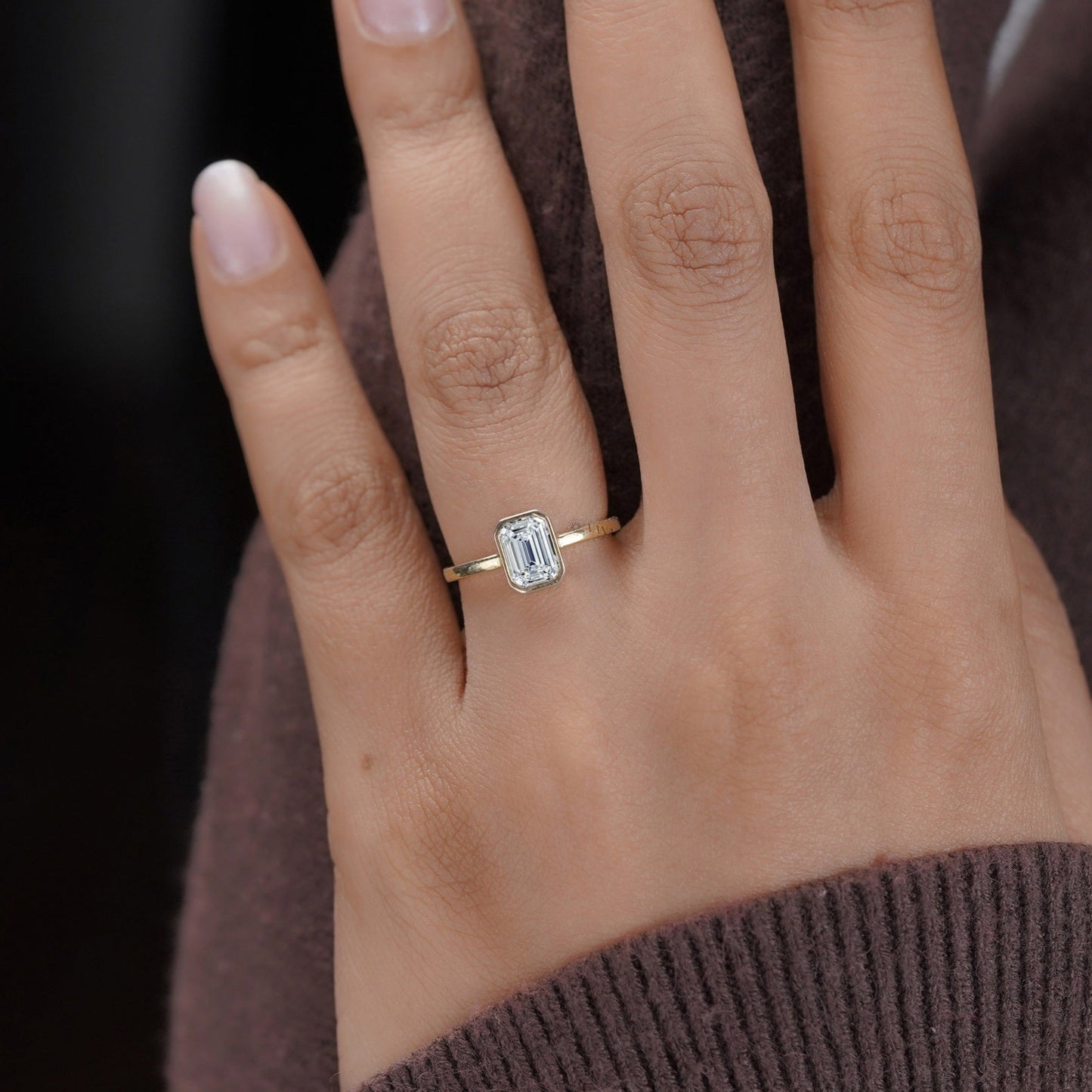 14K gold emerald cut moissanite ring