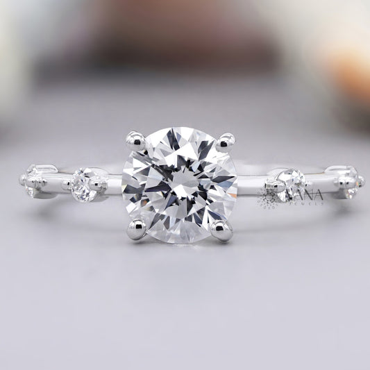 Round cut moissanite engagement ring