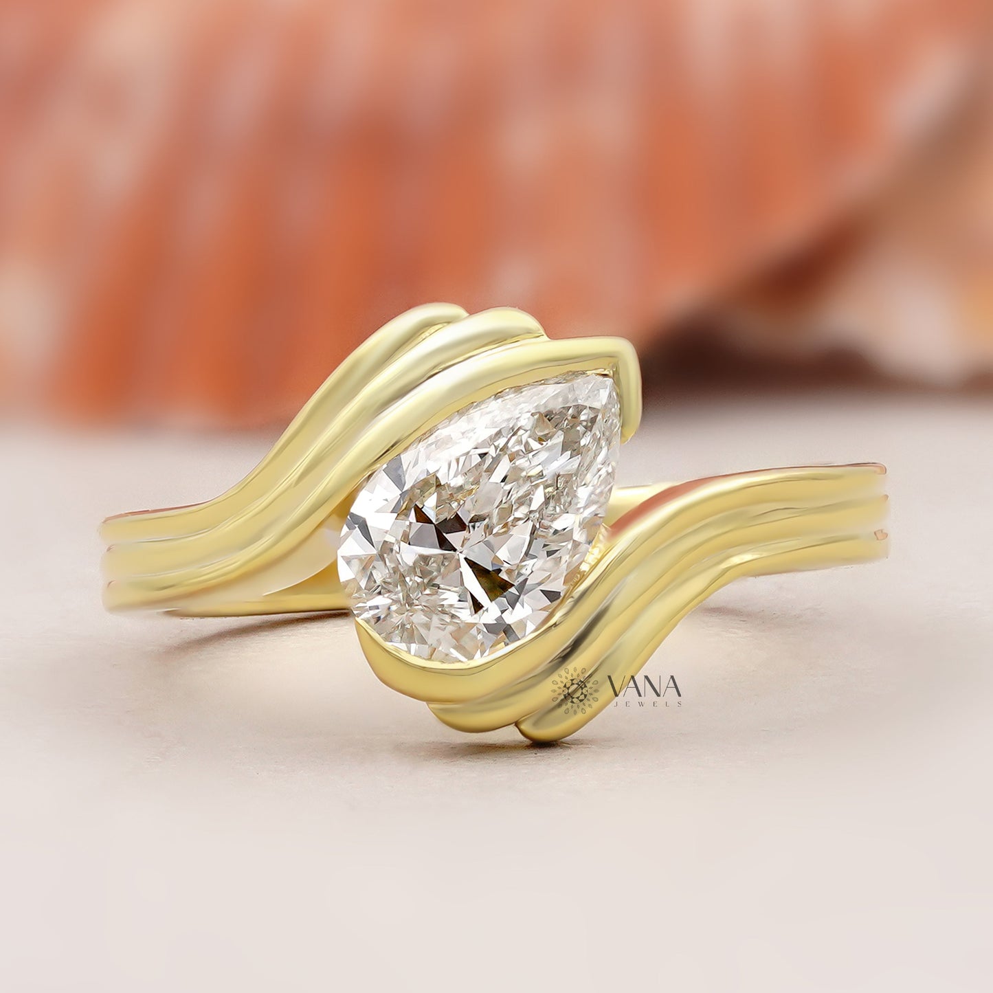 Pear Cut Lab Grown Diamond Solitaire Engagement Ring with Unique Bypass Shank