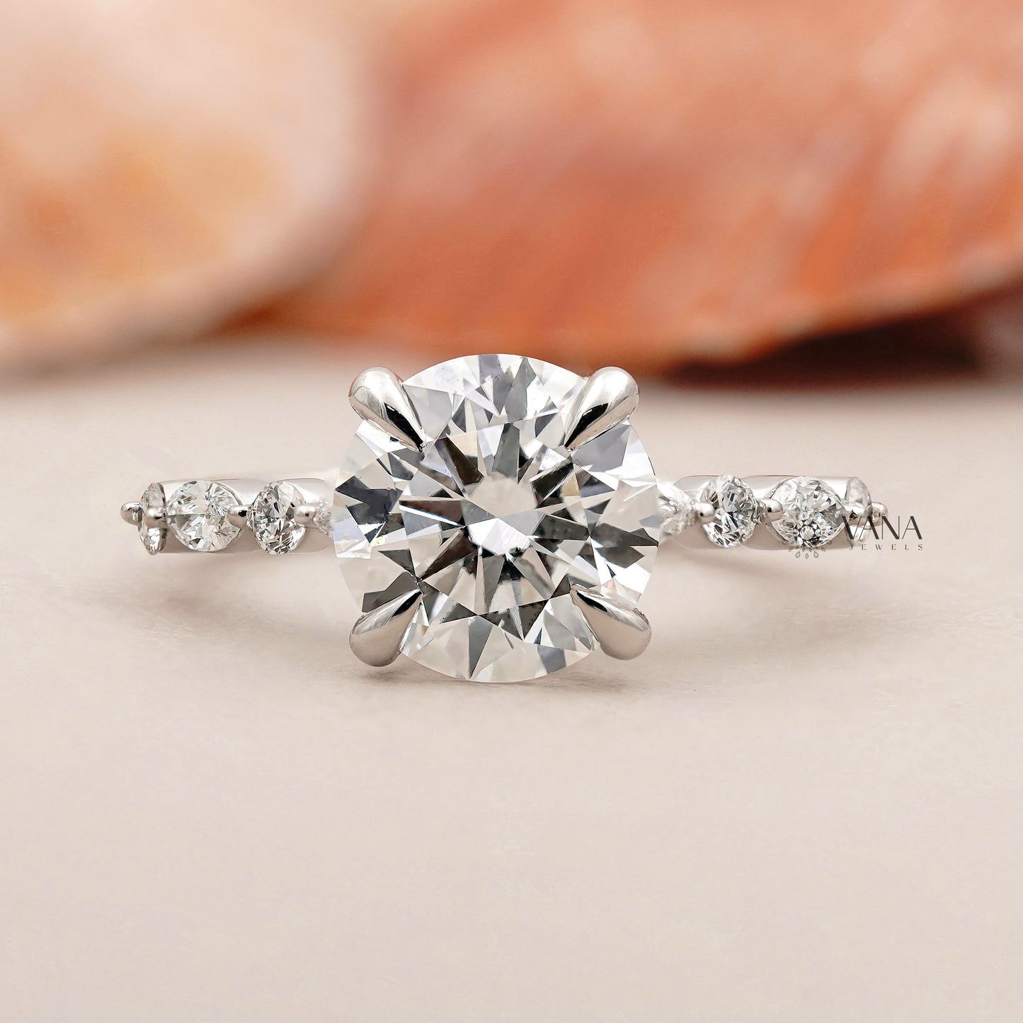 Round Cut Lab Grown Diamond Engagement Ring with Marquise and Round Side Stones