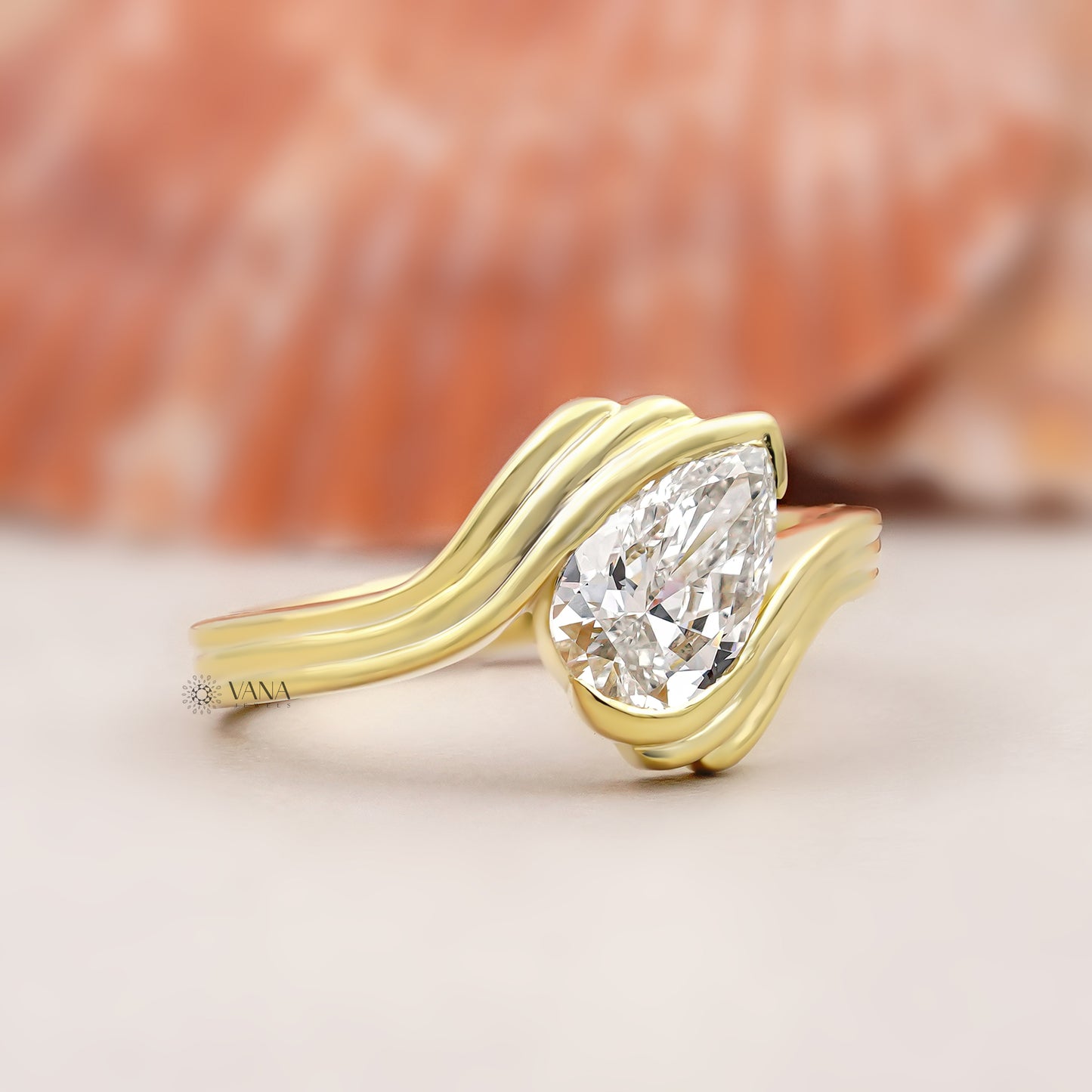 Pear Cut Lab Grown Diamond Solitaire Engagement Ring with Unique Bypass Shank