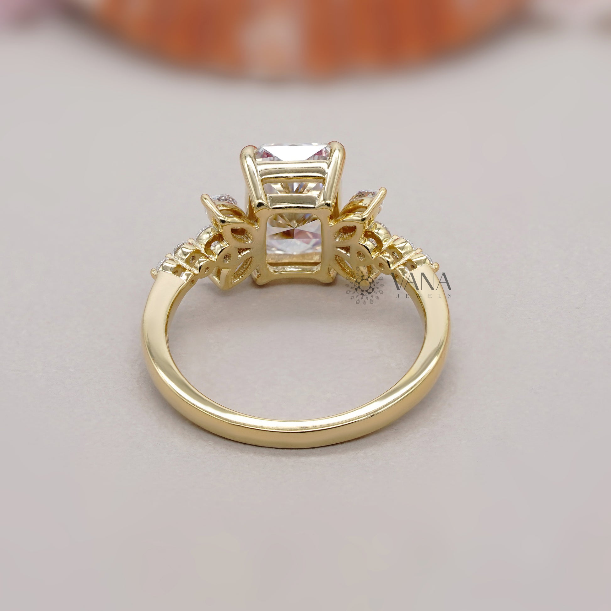 Radiant cut lab grown diamond butterfly cluster ring 
