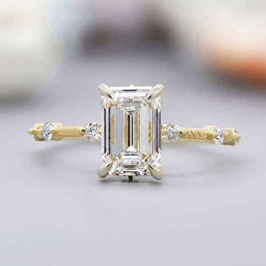 Emerald cut moissanite engagement ring