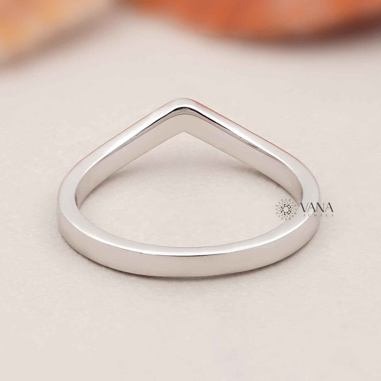 Round cut lab grown diamond V-shape ring