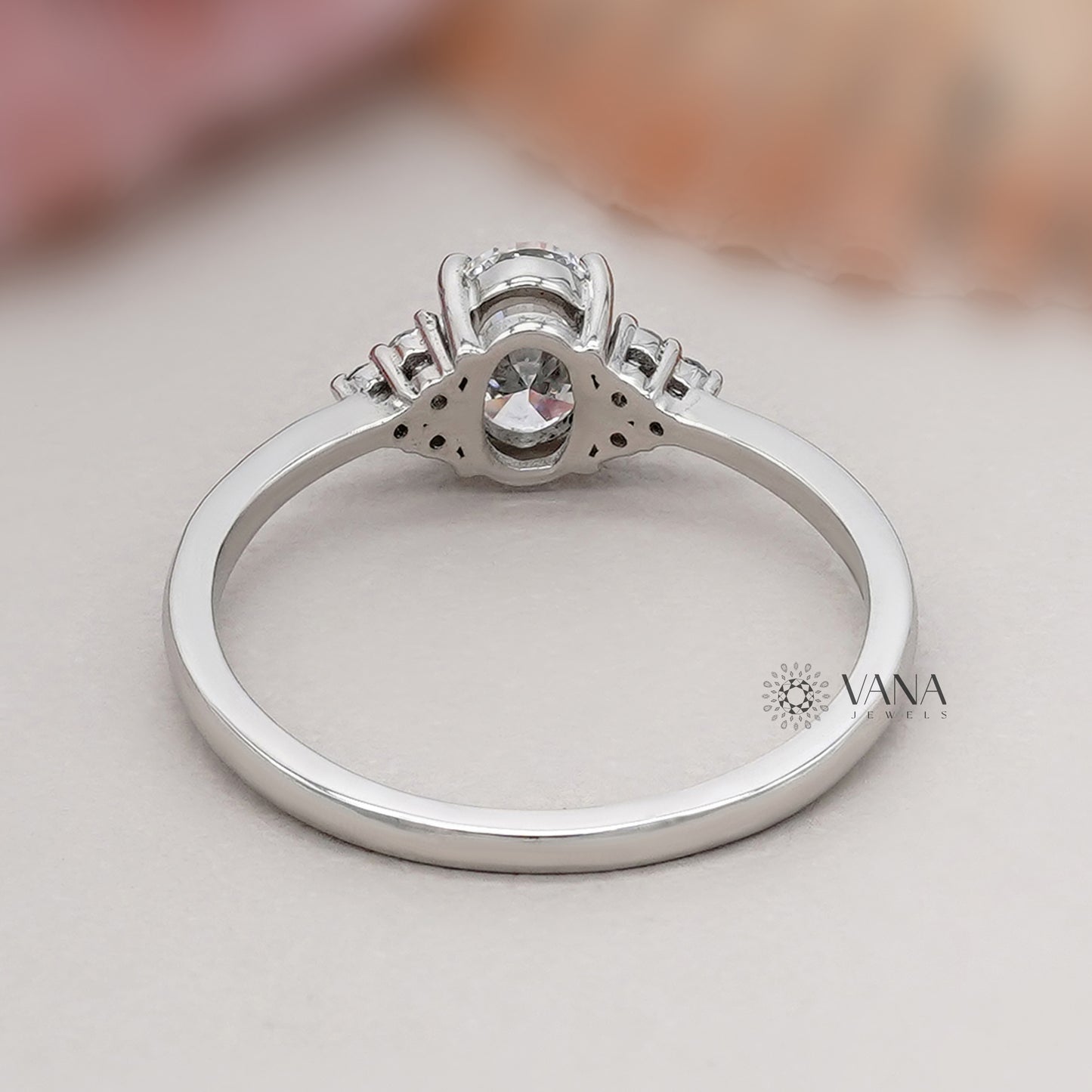 Oval Diamond Seven Stone Engagement Ring with Round Side Diamonds