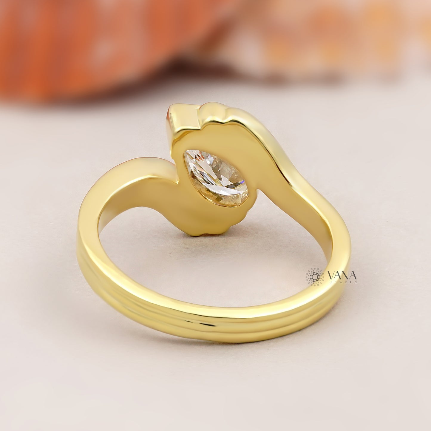 Pear Cut Lab Grown Diamond Solitaire Engagement Ring with Unique Bypass Shank